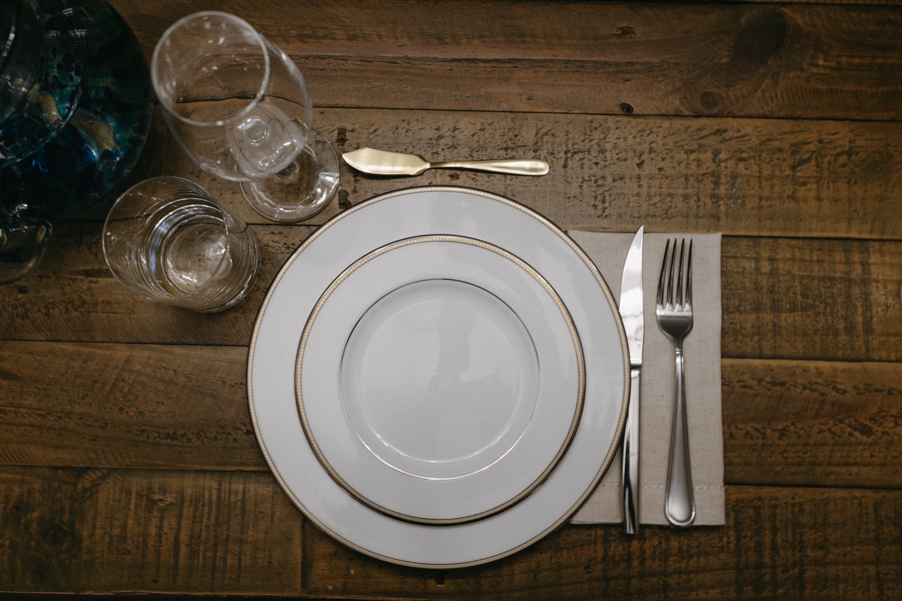 Place setting on rustic wood table